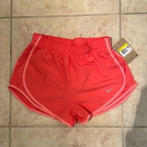 NWT Nike women’s pink running shorts. Size small.